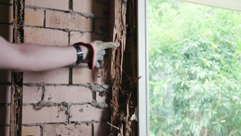 Ripping out a window frame that has been eaten by termites and white ants. Видео 333291220