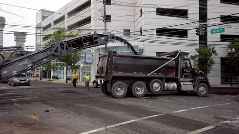 Ripping up a road for repaving Stock Footage 107373086