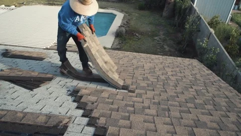 Ripping Shingles - Medium Shot Stock-Footage 329144516