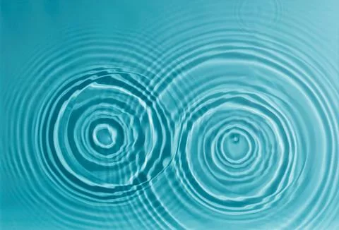 Ripple effect conceptual background with twin water circles Stock Photos
