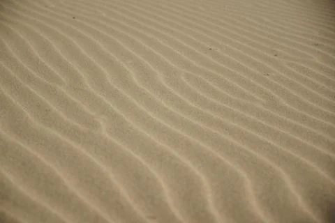 Ripple marks on a sandy beach Stock Photos