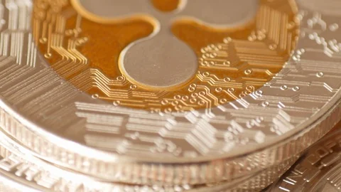Ripple reverse cryptocurrency coin rotating, macro Stock Footage 88424610