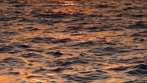 Ripple sea wave. Ocean waves shining on sunrise sun. Stock Footage 139222310