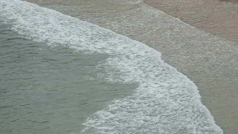 Ripple wave hit sand beach background at day time Stock Footage 132471567