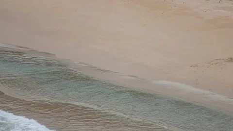 Ripple wave hit sand beach background at day time Stock Footage 132472184
