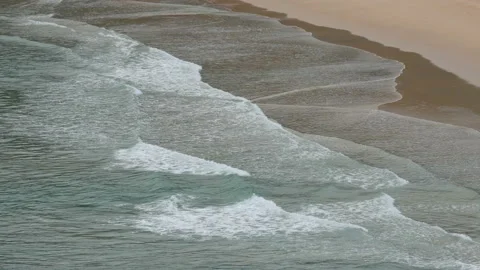 Ripple wave hit sand beach background at day time Stock Footage 132472185