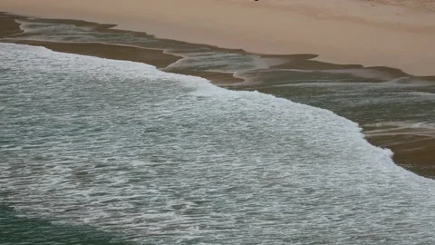 Ripple wave hit sand beach background at day time Stock Footage 132472193