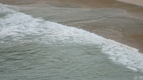 Ripple wave hit sand beach background at day time Stock Footage 132472233
