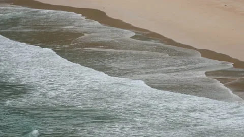 Ripple wave hit sand beach background at day time Stock Footage 132472404