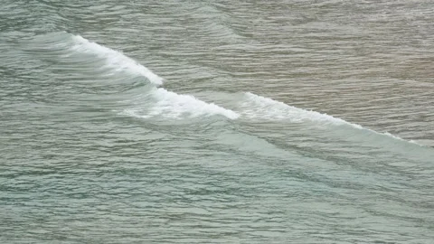 Ripple wave hit sand beach background at day time Stock Footage 132472413