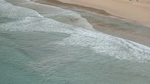 Ripple wave hit sand beach background at day time Stock Footage 132472463