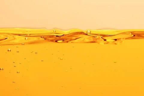 Ripple yellow bright liquid bubbles Stock Photos