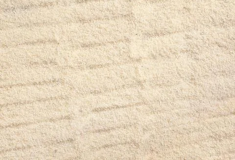 Rippled beach sand texture Stock Photos