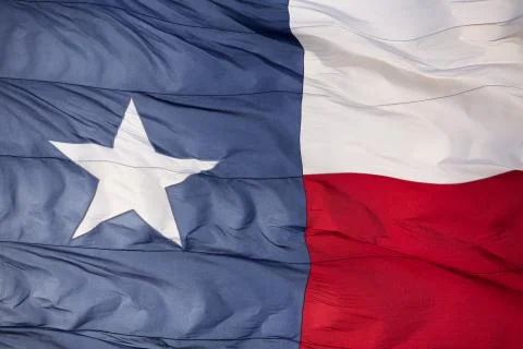 Rippled flag of the state of texas Stock Photos