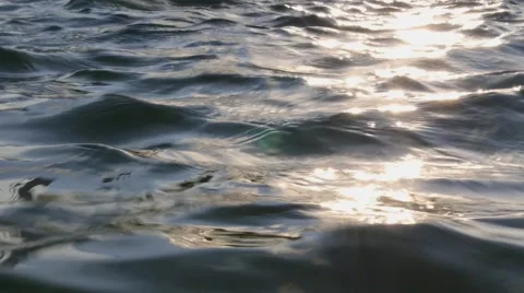 Rippled Surface of the Water with Sunset Stock Footage 54308772