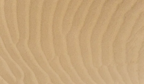 Rippled texture of sand Stock Photos