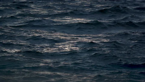 Ripples and small waves on dark blue water in Baltic sea in the evening. Video stock 235560561