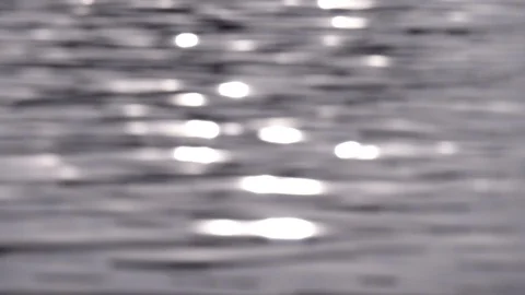 Ripples and sun glare on the waves water. Sea ripples. Sun glare on the water Stock Footage 121317449