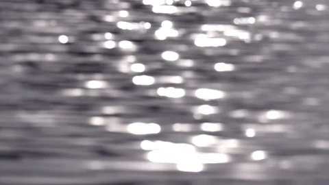 Ripples and sun glare on the waves water. Sea ripples. Sun glare on the water Stock Footage 121317785