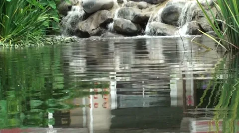 Ripples And Waterfall In A Pond Stock Footage 33317829
