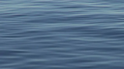 Ripples on a blue stretch of water Video stock 48634594