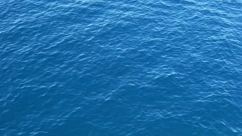 Ripples on the blue surface of the sea Stock Footage 169369439
