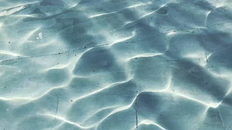 Ripples on a blue surface of water Stock Footage 94215444