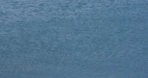 Ripples on blue water surface Stock Footage 210075528