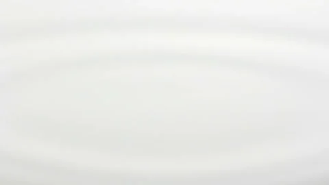 Ripples of Milk Stock Footage 327403802