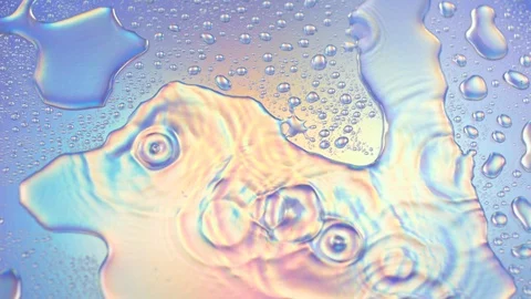 Ripples on puddle with iridescent light Stock Footage 93215885