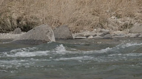 Ripples on river flow in summer Stock Footage 92843273
