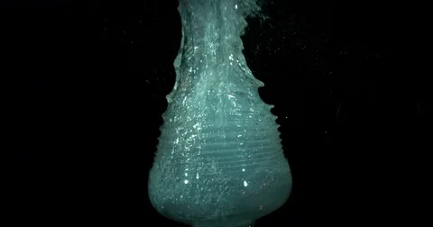 Ripples Splash Up from Exploding Margarita Glass Video stock 77781288