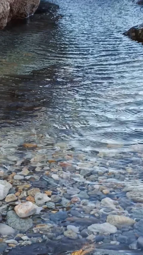 Ripples on the surface of the water at low tide on the ocean floor at low ti Stock Footage 236644331