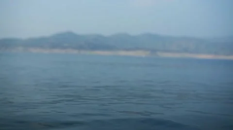 Rippling Lake by Mountain Range Stock Footage 47210934