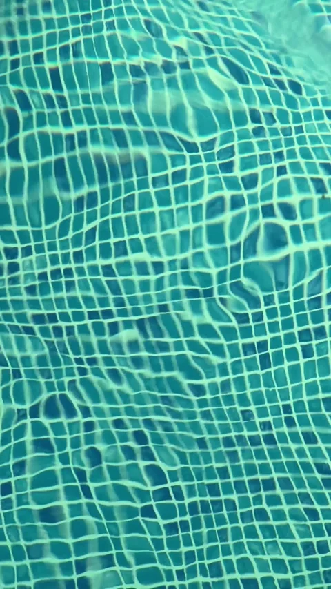 Rippling water patterns in a sunlit pool: mesmerizing aquatic textures and Stock Footage 315671351