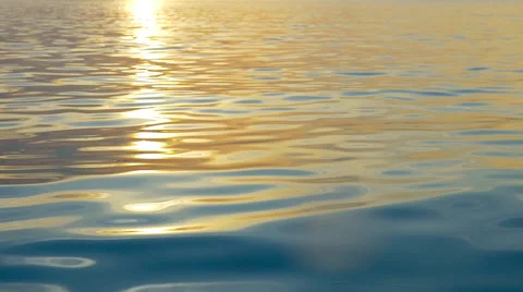 Rippling water with sunset reflection Stock Footage 61632070