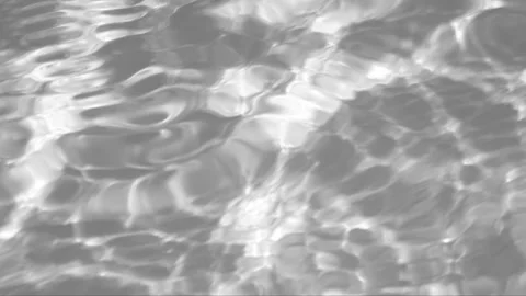 Rippling water surface with reflections and moving light patterns 動画素材 342250228