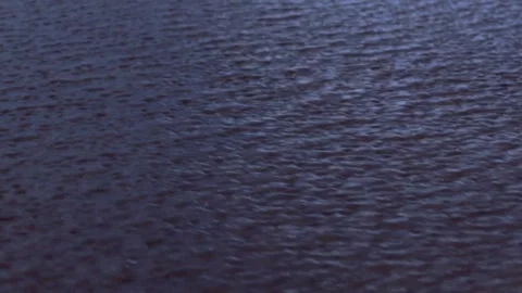 Rippling water surface texture on wet sandy beach at dusk Jurmala Latvia Stock Footage 344356117
