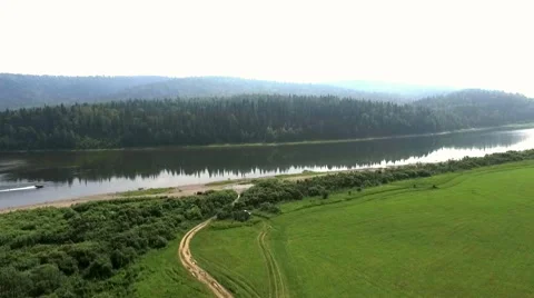 The rise above the river on which the moving motor boat Stock-Footage 68274616