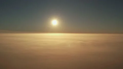 Rise above the thick fog until the morning sunrise. Aerial view Stock Footage 204058639