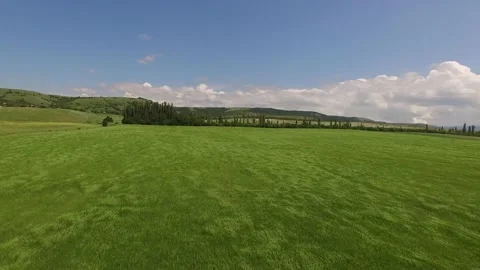 The rise of the camera over industrial fields surrounded by mountains. bird's Stock-Footage 91045803