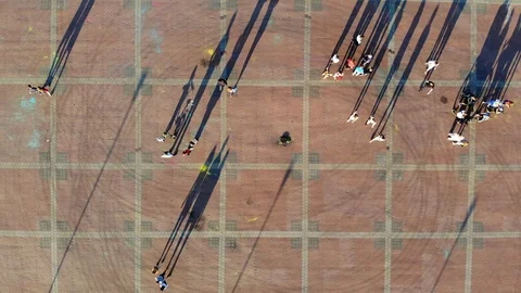 Rise up on drone over the area with walking on her people in summer Sunny day Stock Footage 122700580