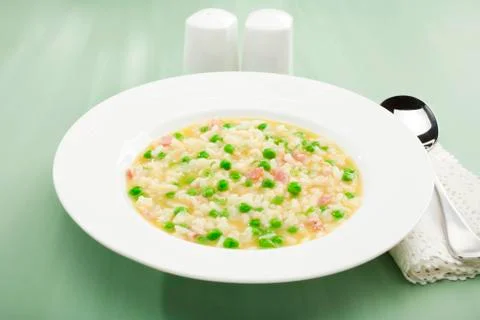 Rise e bisi risotto soup rice and peas italian food Stock Photos