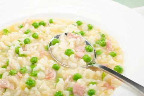 Rise e bisi risotto soup rice and peas italian food Stock Photos