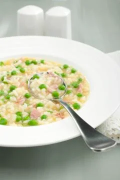 Rise e bisi risotto soup rice and peas italian food Stock Photos