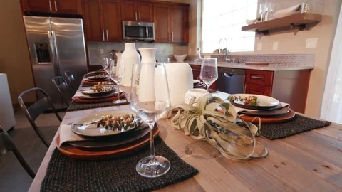 Rise from End of Large Dining Room Table in Kitchen Stock Footage 77168407