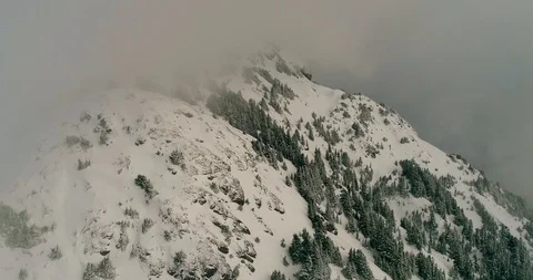 Rise from mountain into clouds Stock Footage 91462313