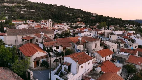 Rise up over red roofs of authentic village in central Cyprus Stock Footage 107670939