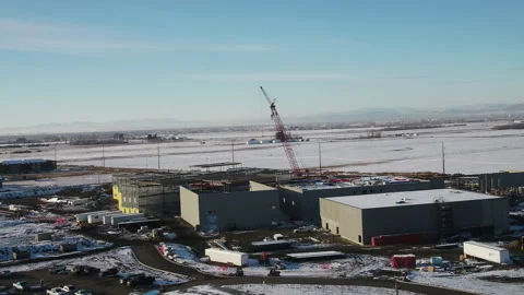 Riser aerial of a crane on a construction project Stock Footage 284967302