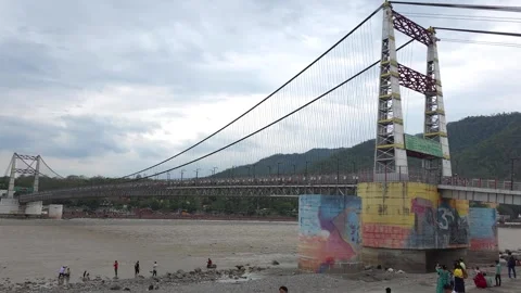 Rishikesh Bridge: Gateway to Adventure and Peace Stock Footage 313564472
